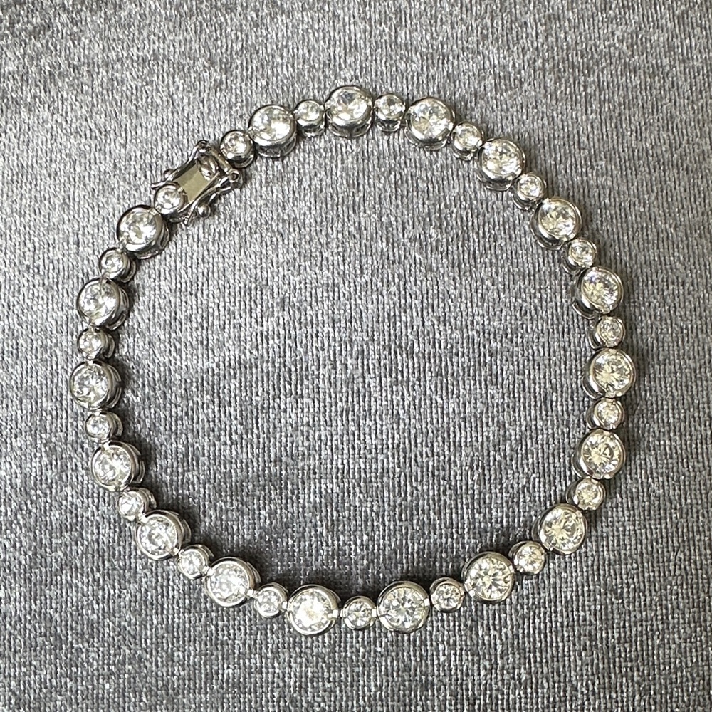 Elegant Silver PAJ 925 Tennis Bracelet with Round Bezel Set Stones  8" inches